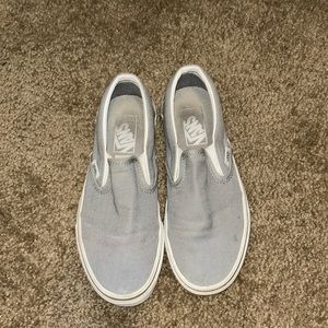 Gray women’s vans. Worn. Size 7 in women and size 5.5 in men.